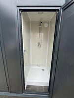 Sanitärcontainer mit Toilette, Waschbecken und anbaubarer Dusche, grau